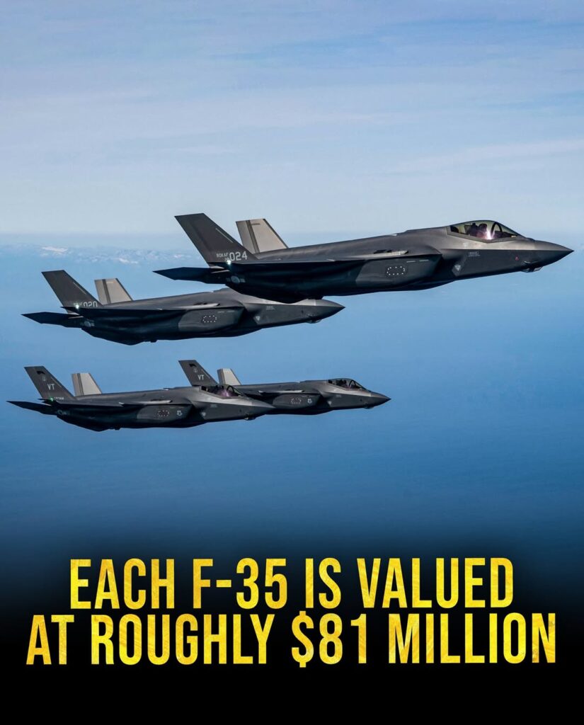 Two F-35B fighter jets parked on an aircraft carrier deck.