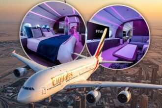 The master suite aboard the 9H-FIVE, featuring a king-size bed and elegant decor.